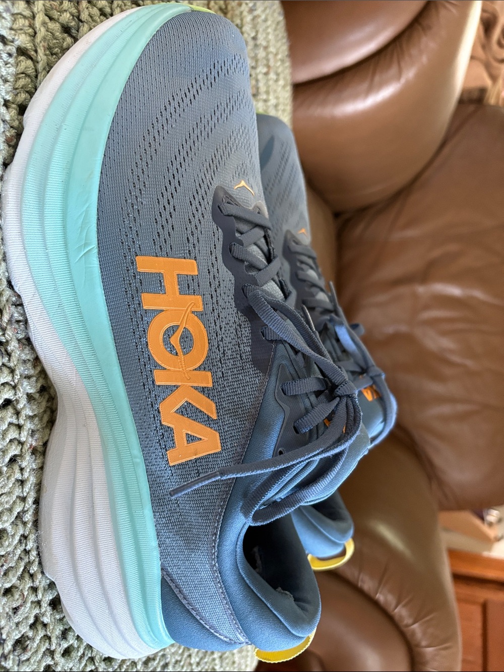 Hoka Gray Running Shoes with Orange Logo and Mint Accent